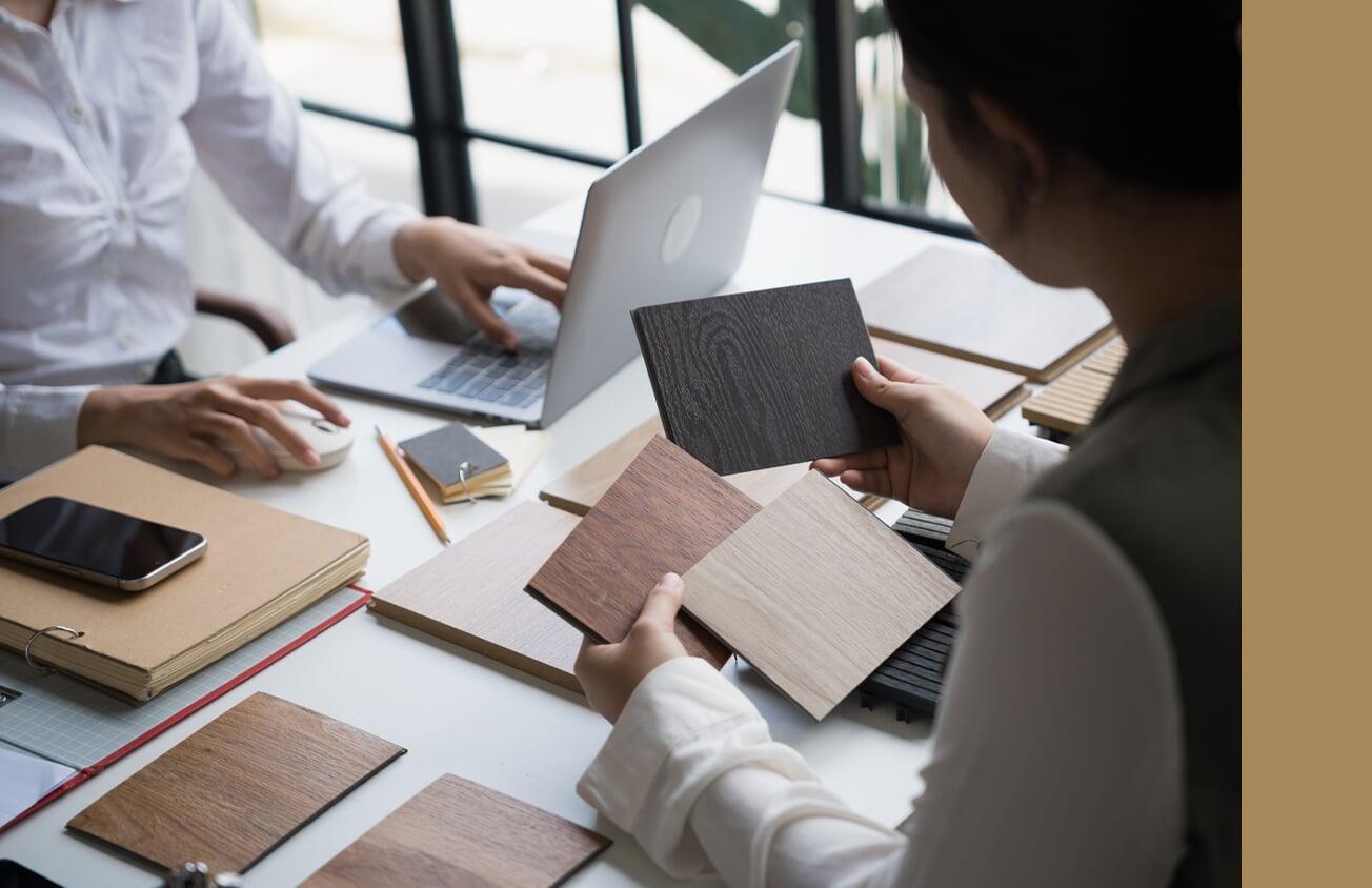 Designers looking at wood samples